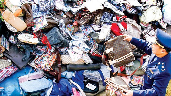 Bùng nổ công nghiệp hàng giả: Gian nan ngăn chặn ảnh 1
